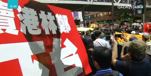 Гонконгта мыңдаған адам экстрадиция туралы заң жобасына қарсы шеруге шықты