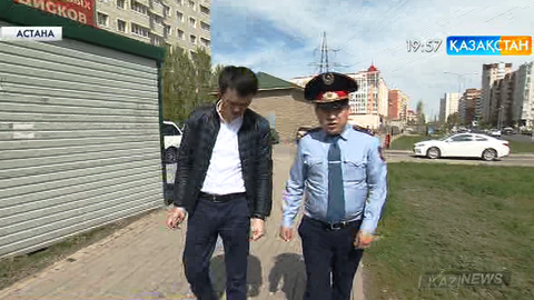 Елордалық полицей Жаннат Набиуллин құдыққа түсіп кеткен қария мен немересін алып шықты