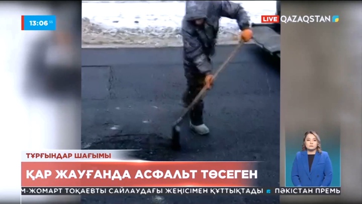 Абай облысының Көктерек ауылында мердігерлер қар жауғанда асфальт төсеген