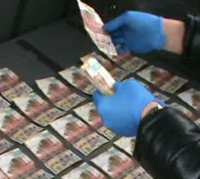 Жалған ақшамен есеп айырысқан